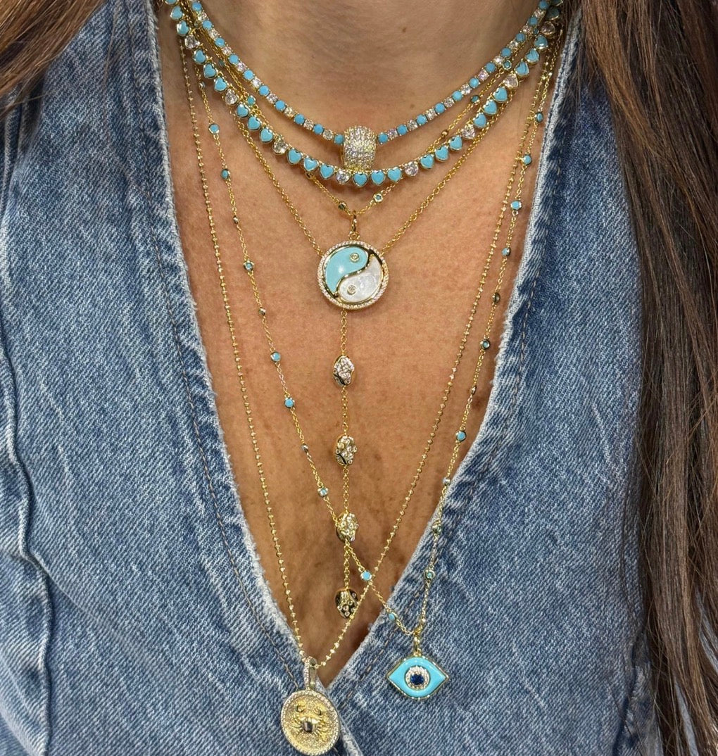 LONG STRAND NECKLACE